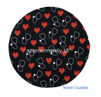 Round product with stethoscope and heart pattern on a black background, labeled 'approximately 18"