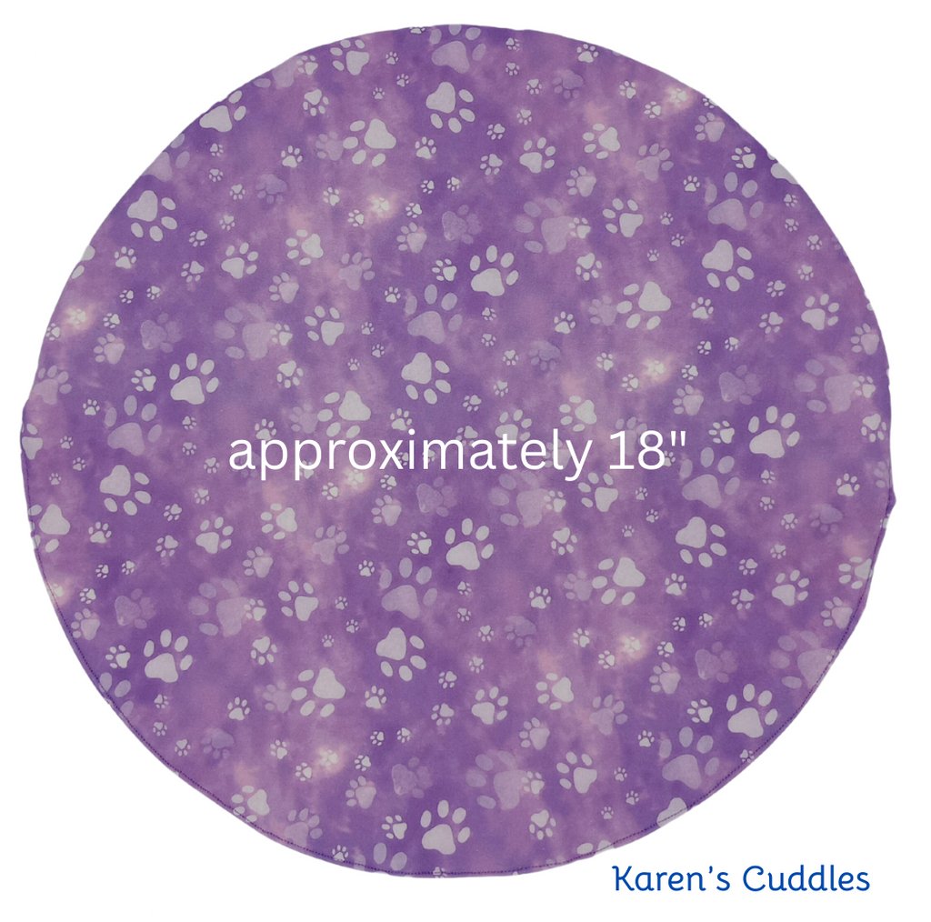 Purple circle with paw prints and text indicating size and brand 