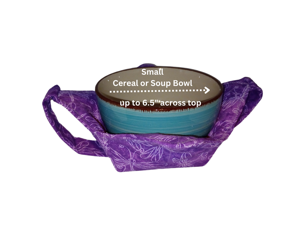 Purple dragonfly fabric bowl cozy holding a small turquoise soup bowl