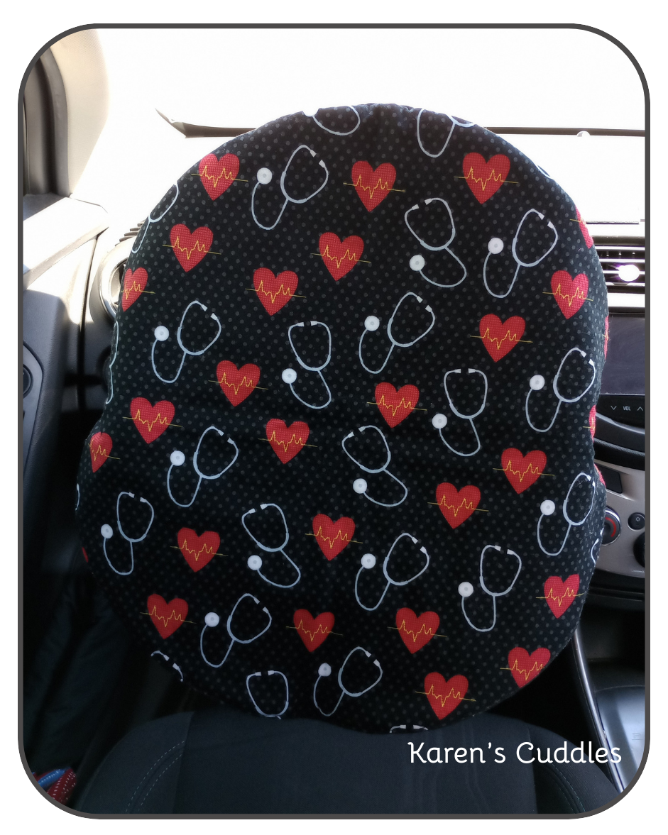 read hearts with heart beat lines and stethoscopes on black fabric with grey polka dots steering wheel cover