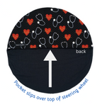 Steering wheel cover with heart and stethoscope pattern on top and black color on the bottom, labeled 'back'.