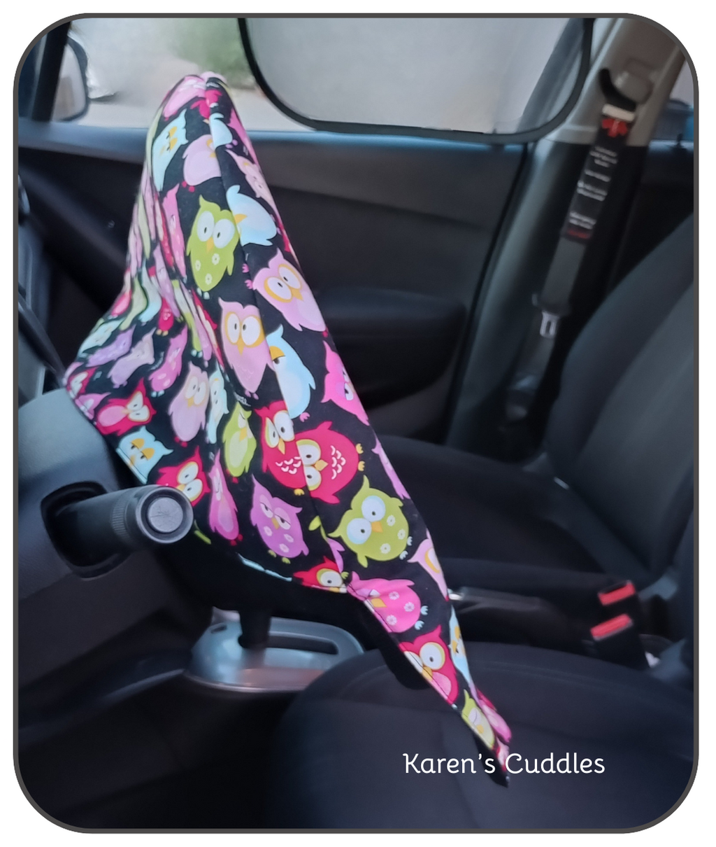 Colorful Owl Pattern on black fabric, slip cover for steering wheel. Reducing heat and sun exposure.