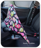 Colorful Owl Pattern on black fabric, slip cover for steering wheel. Reducing heat and sun exposure.