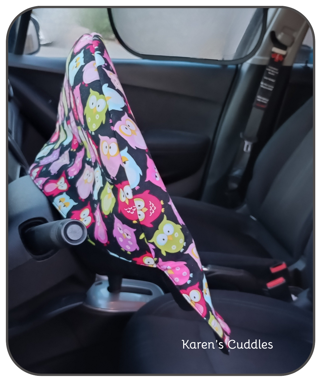 Colorful Owl Pattern on black fabric, slip cover for steering wheel. Reducing heat and sun exposure.