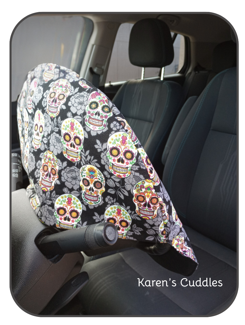 Steering Wheel Cover featuring colorful sugar skulls and black cotton fabric, help reduce sun and heat exposure.