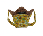 yellow and brown sunflowers with green leaves on white fabric, reversible to a brown fabric with brown leaves. This cozy is shaped to hold pint size ice cream containers and 14 ounce mason jars, features a strap for hand support.