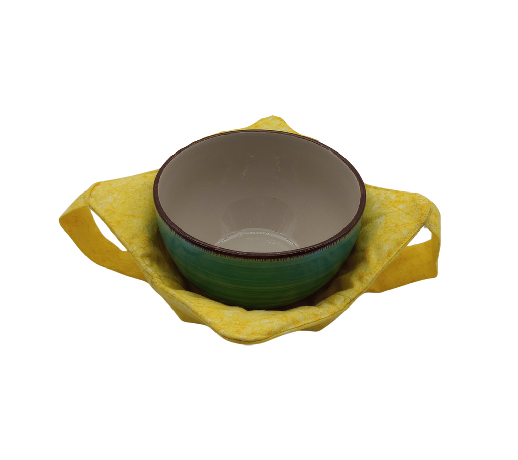 Bright yellow fabric bowl holder with a strap for hand support