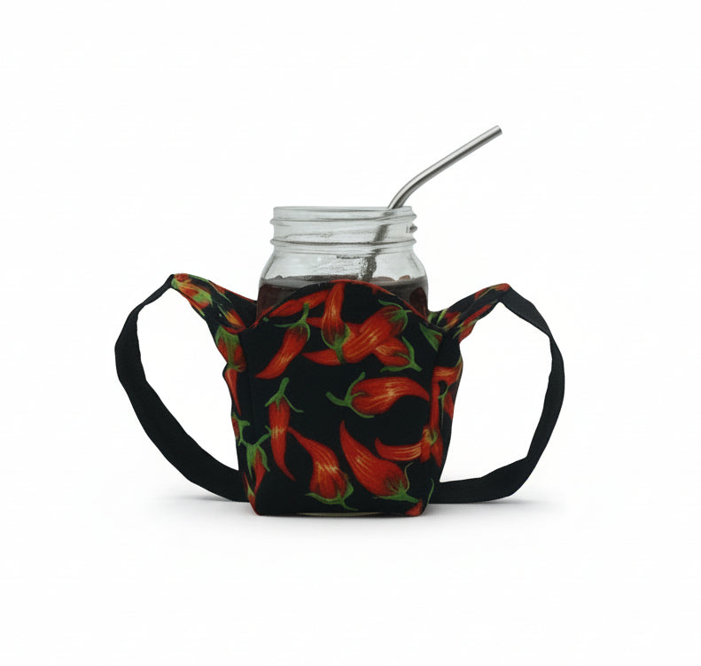 chili peppers on black fabric holder with black strap,  mason jar inside