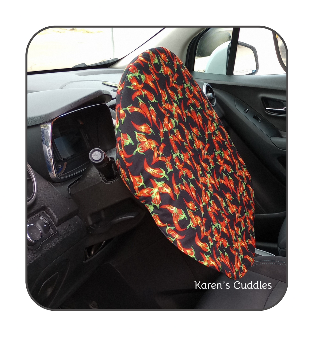 Help keep your steering wheel a little cooler and minimize sun exposure, especially during these hot summer days by slipping this cover over your steering wheel before leaving your car. 