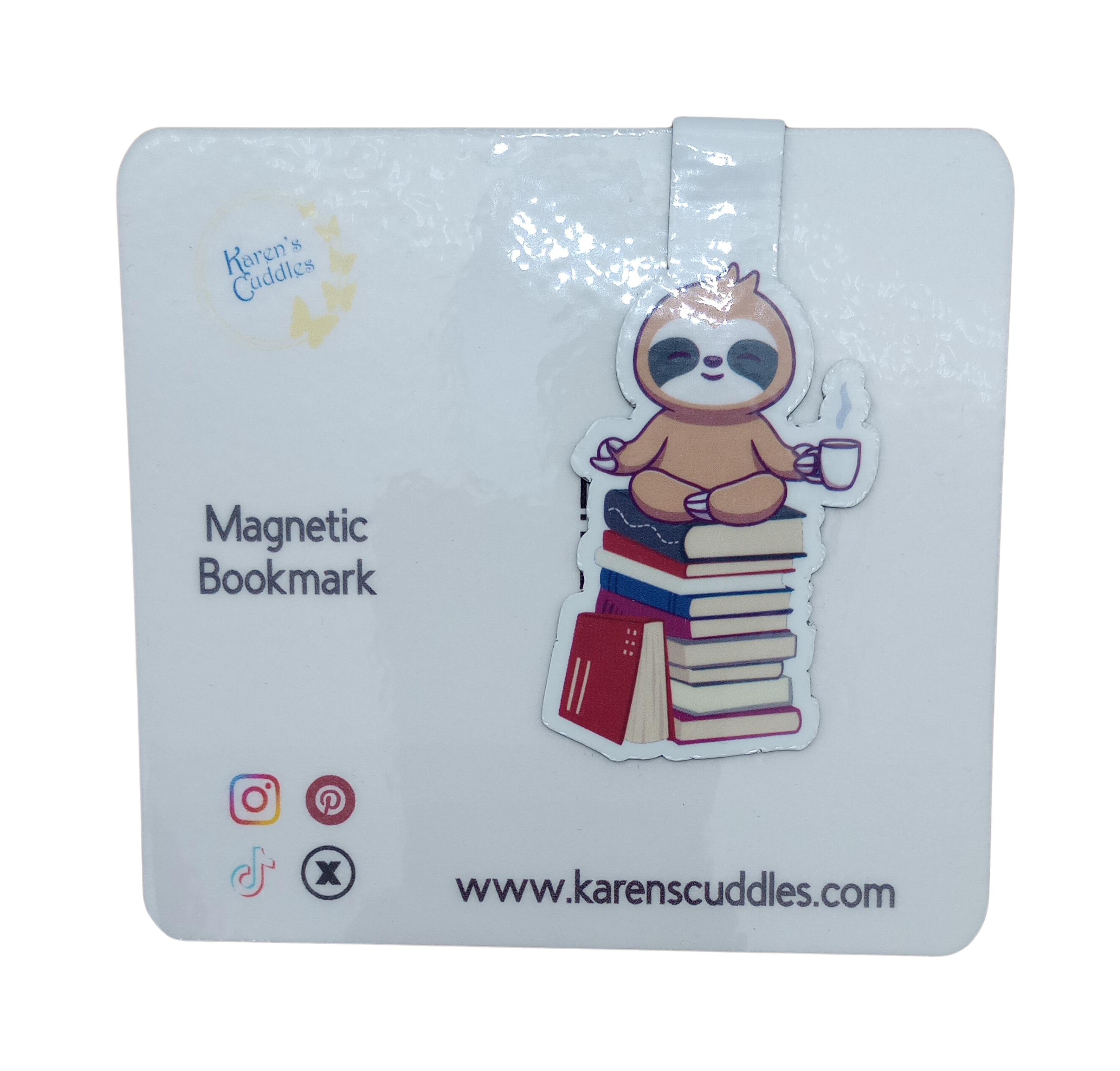 magnetic bookmark of a sloth sitting on stack of books while meditating and holding cup of coffee