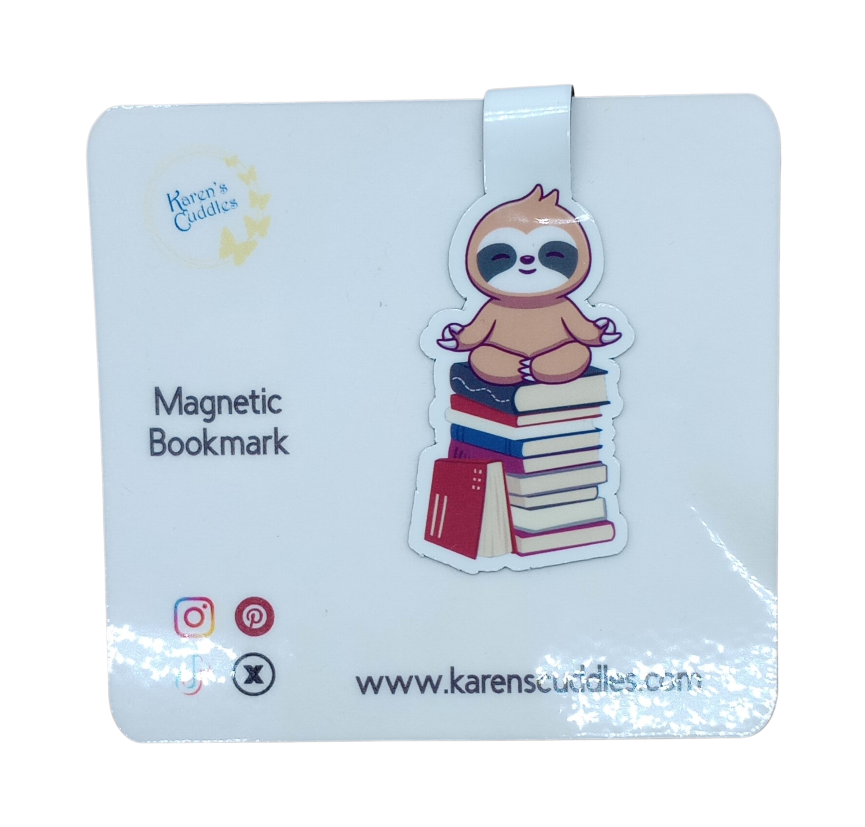 magnetic bookmark with a sloth meditating on a stack of books