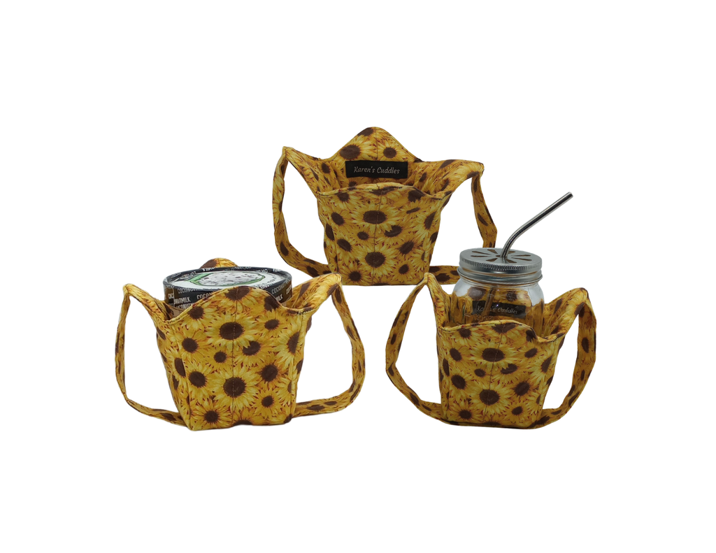 Three sunflower-patterned pint size cozies, mason jar in one and ice cream container in another