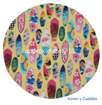 round wheel cover with surfboards on yellow fabric showing dimensions