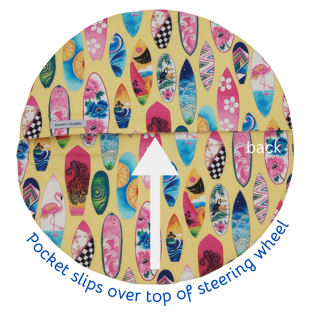 back of steering wheel cover with surfboards on yellow fabric